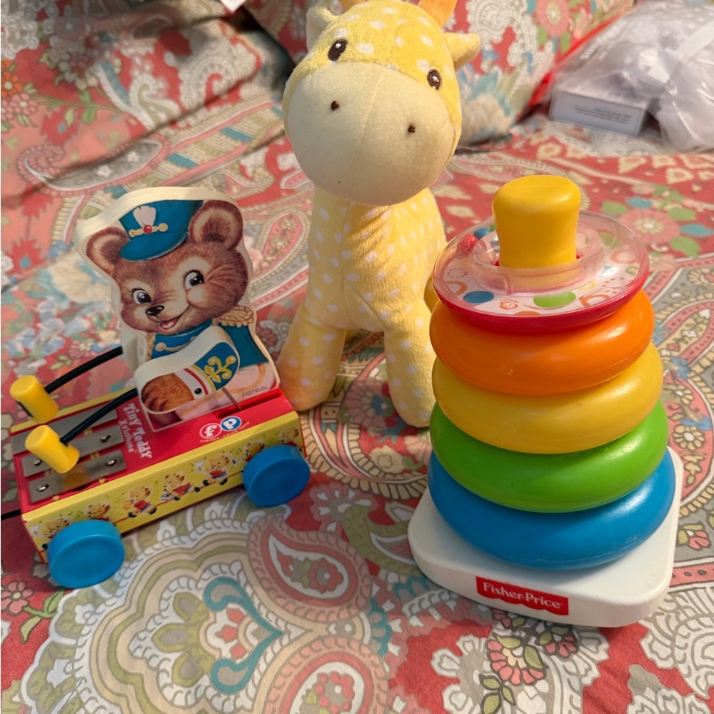 Fisher-Price Colorful Stacking Rings Toy, Bear xylophone, and Gund giraffe